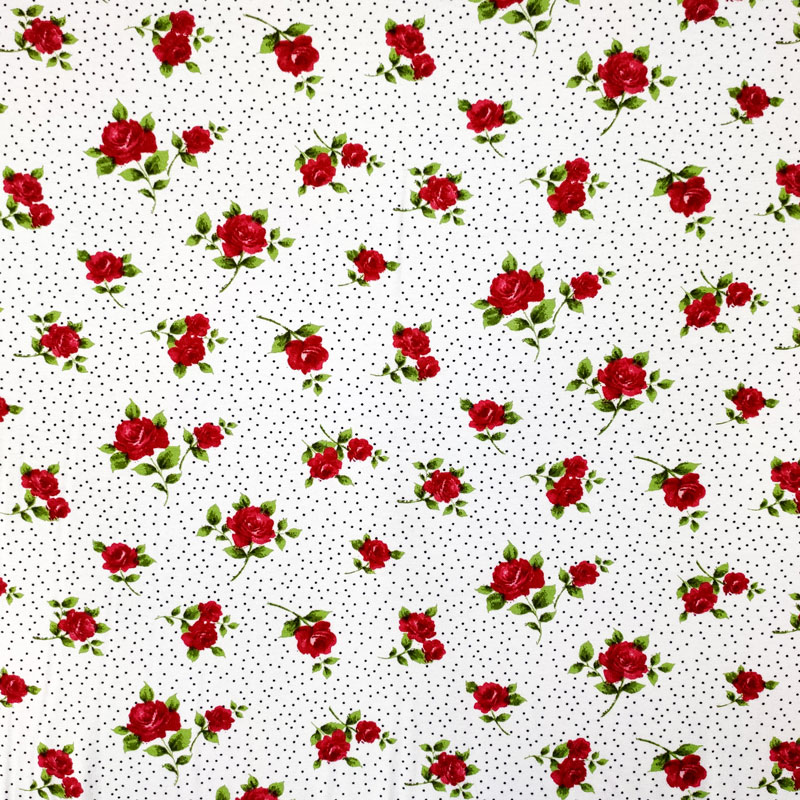 maglina-rose-rosse-sfondo-bianco-pois