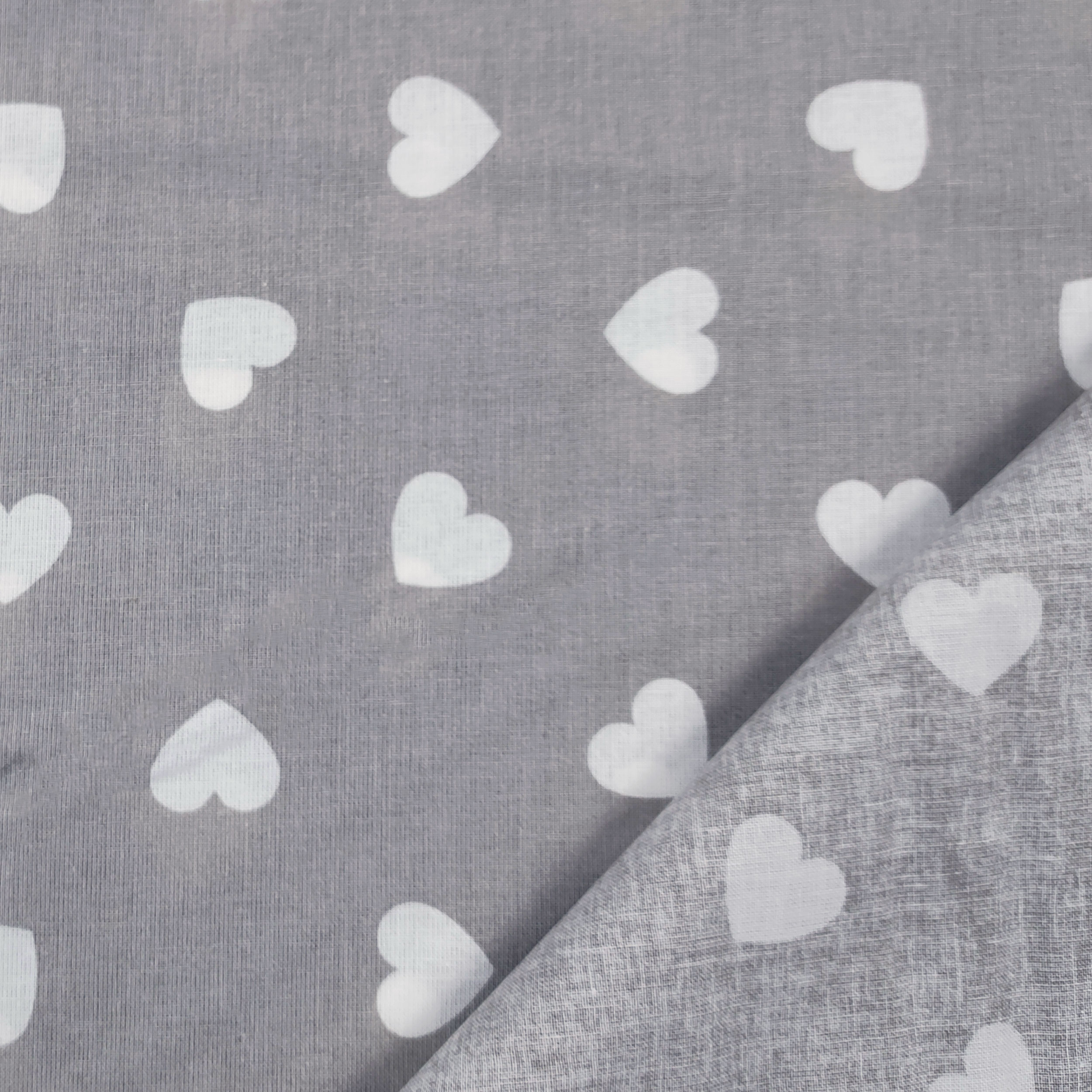 Cotone Fantasia Cuori Bianchi con Sfondo Grigio