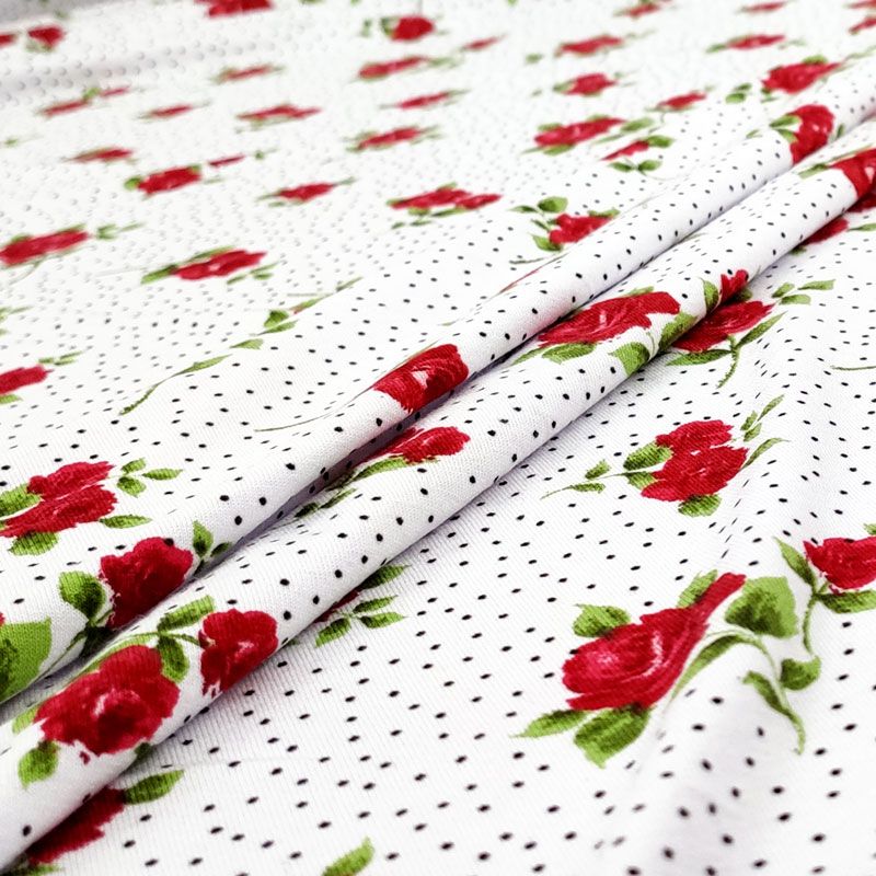 maglina-rose-rosse-sfondo-bianco-pois