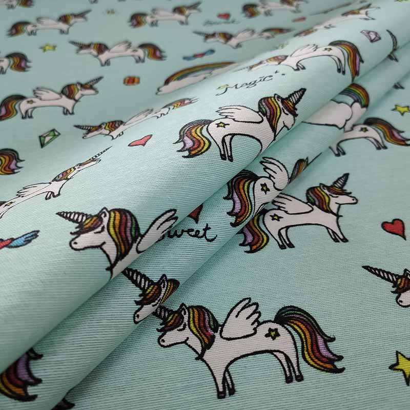 tessuto-fantasia-unicorni-arcobaleno