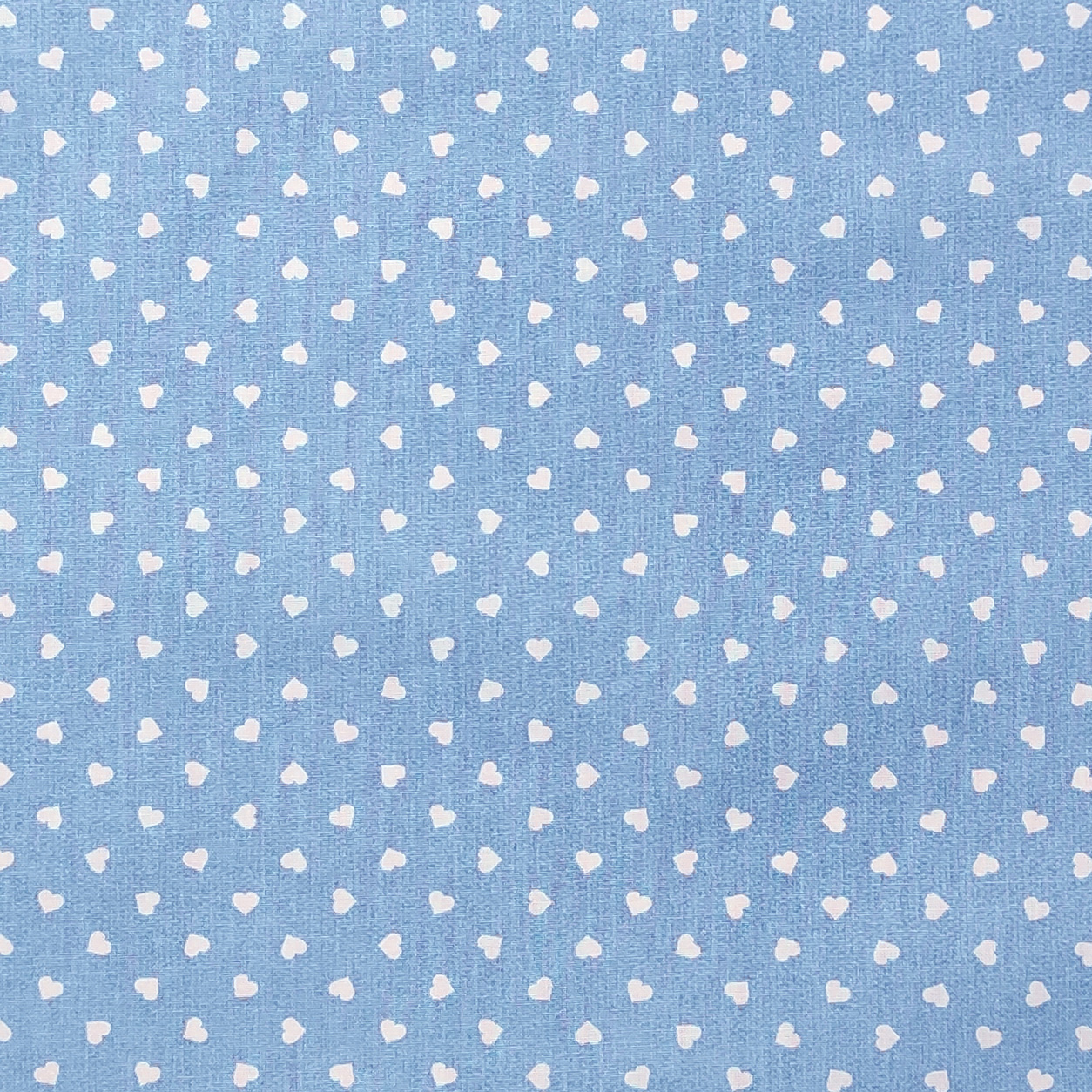 tessuto cotone percallino cuori bianchi sfondo azzurro
