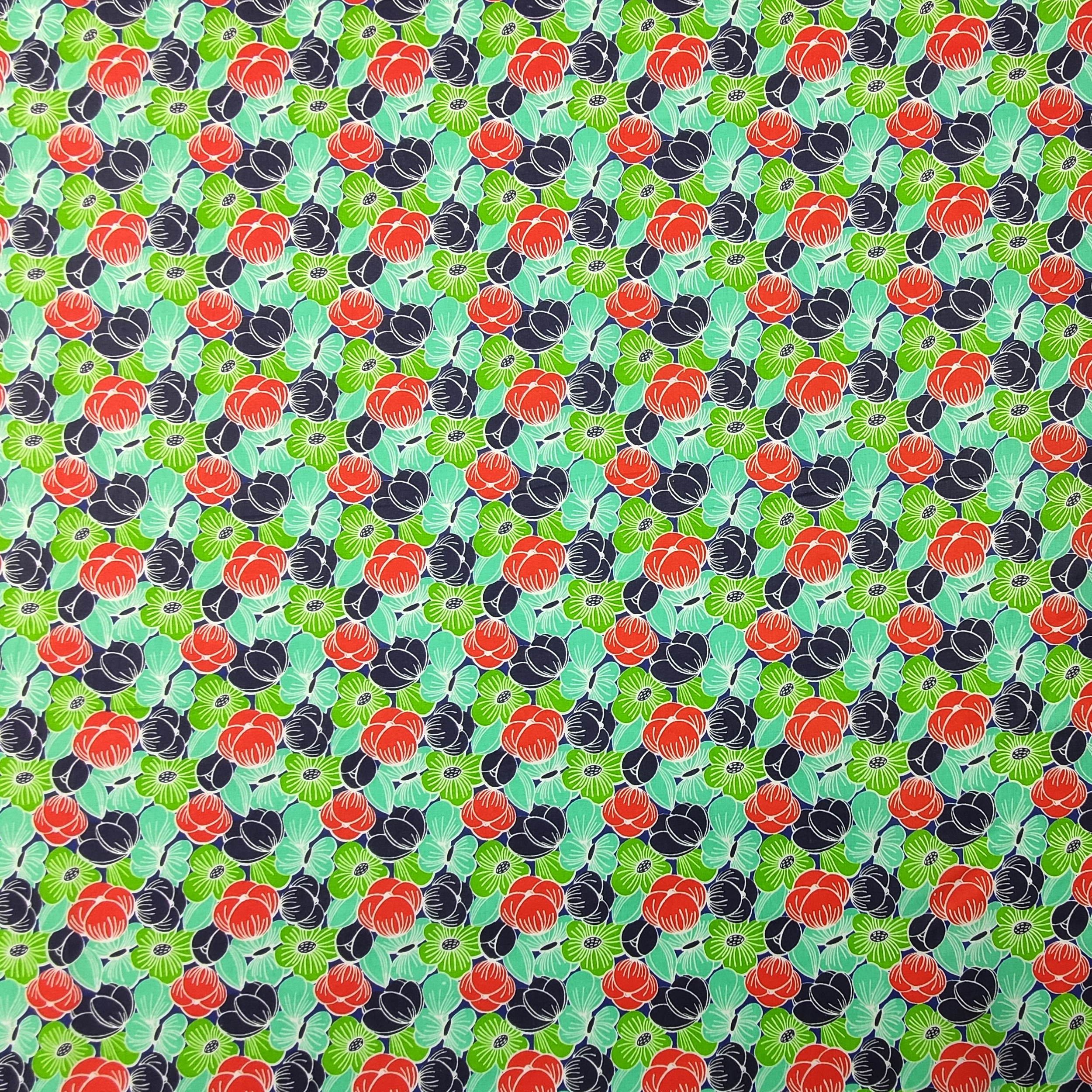 cotone oeko-tex con fiori verdi e rossi