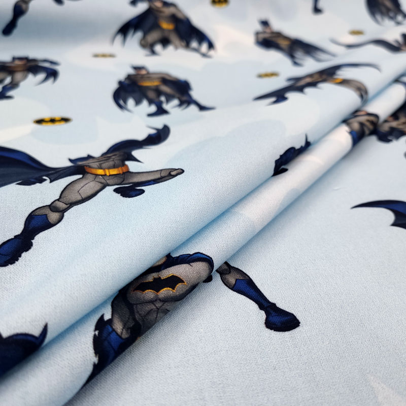 Tessuto di cotone batman azzurro
